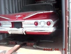 '59 Chevy 4-door sedan loaded in conatiner