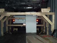 Ford Ranger pick up truck loaded on floor at nose of container,