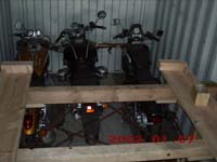 Container loaded with three motorcycles